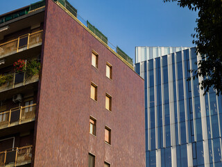 Modern office and residential buildings along via Gattamelata in Milan, Italy