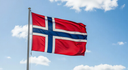 The Norwegian Flag Flies Proudly on a Clear Blue Day Under White Clouds