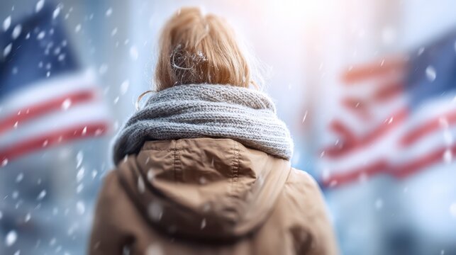 Woman walks in snow wearing warm coat and scarf woman navigates through snow bundled in coat and scarf