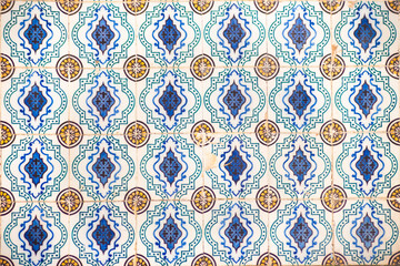 Beautiful Azulejo tile pattern showcasing traditional Portuguese artistry. Intricate blue, yellow, and white design, perfect for backgrounds and cultural themes.