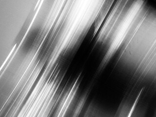 abstract metal background. Blurred grey black metal abstract background. stainless backdrop with...