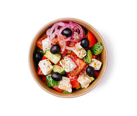 Fresh Greek salad with cucumbers, tomatoes, and feta cheese in a bowl