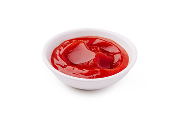 Bowl of bright red ketchup on a plain white background