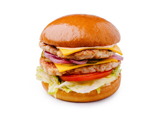 Delicious burger stacked high with cheese, lettuce, and fresh vegetables