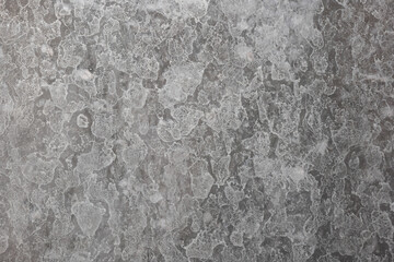 Hard water Calcium or lime scale deposit stains on a shower glass window. Close up, macro shot, no people