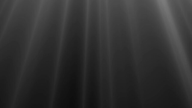 Soft, atmospheric white volumetric light rays gently drift from top of frame. Ideal for moody intros, heavenly scenes, or abstract visuals