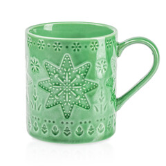 Green ceramic mug with embossed snowflake and decorative winter patterns, isolated on white background. Cozy Christmas or holiday-themed cup for hot drinks like coffee, tea, or cocoa