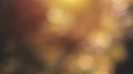 Loopable abstract golden bokeh particles, sunshine atmosphere, warmth ethereal floating lflickering light spots background - Powered by Adobe