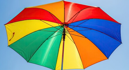 A colorful umbrella with a blue, red, yellow, and green section.