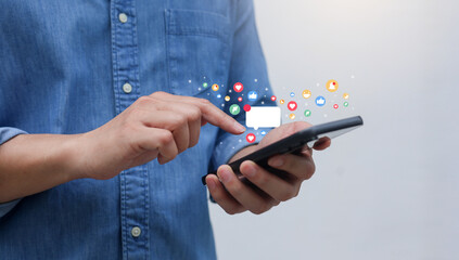 slow motion scene young man hand use smartphone to check news feed from social media network application while sitting in cafe at relaxing time for city lifestyle concept