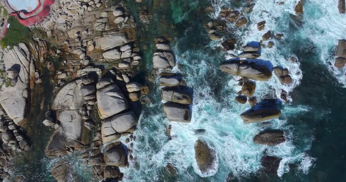 Aerial top view of Maiden's Cove Tidal Pool in Clifton, Cape Town, South Africa.	