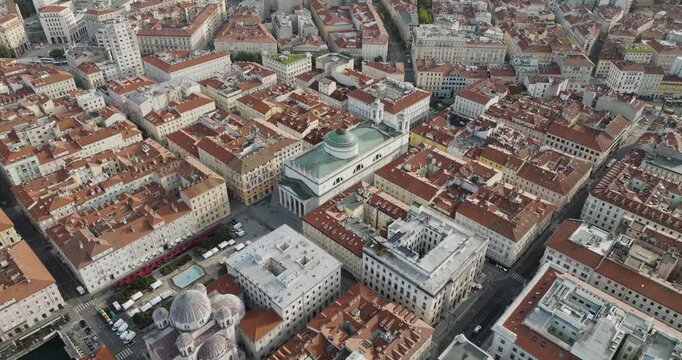 Aerial view of Piazza Unit&agrave; d'Italia showing the architectural landscape where the buildings are dominated by red and white colors, Trieste, Friuli-Venezia Giulia, Italy.