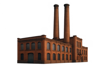 Old industrial brick factory building with two smokestacks, representing historical production and energy