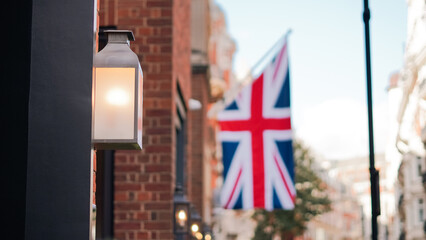 British flag above London street captured in urban street photo