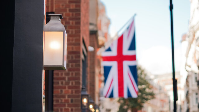 British flag above London street captured in urban street photo
