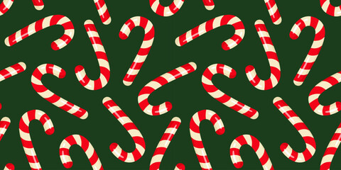 Candy Canes on green background. Merry Christmas and Happy New Year design for wrapping paper, packaging, wallpaper, textile, fabric, notebook, greeting cards