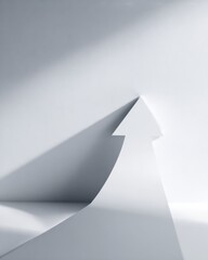 Fototapeta premium Paper arrow casting long upward shadow, representing business growth and vision.