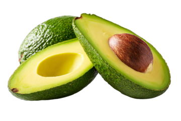 Fresh ripe avocado fruit cut in half with seed isolated on transparent background — green tropical fruit rich in healthy fats