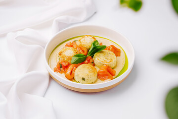 Fresh gourmet dish featuring creamy cheese and diced tomatoes with basil