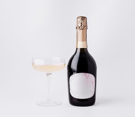 Sparkling wine and elegant glass set on a simple surface for celebration