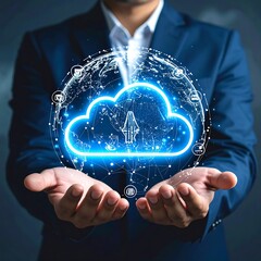 A business professional presents a glowing blue cloud symbol, surrounded by a network sphere, held in both open hands. Dark suit, neutral background