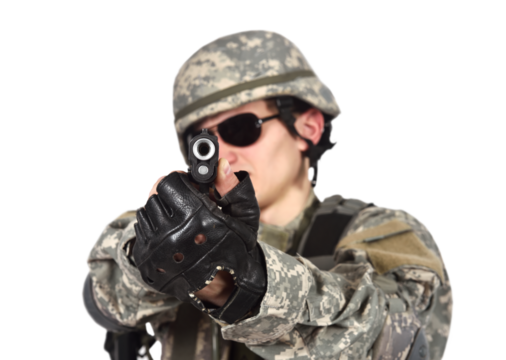A soldier in camouflage clothing fires a pistol.  Military combat and war concept
