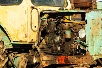 Extreme Close-up of a Worn, Exposed Vintage Tractor Engine and Machinery