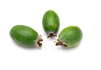 Three green Feijoa sellowiana or Pineapple guava isolated on white, top view
