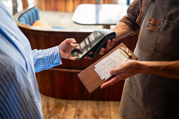 Smart restaurant technology and digital transformation making fast secure cashless transactions easy