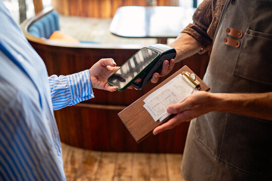 Smart restaurant technology and digital transformation making fast secure cashless transactions easy