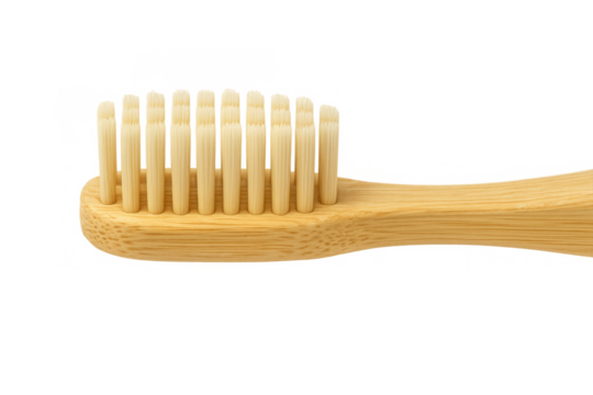 Bamboo toothbrush head showing natural wood bristles for eco-friendly dental care and sustainable personal hygiene