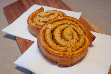 Sticky Buns, sweet, cinnamon-filled buns with a layer of caramel sauce and almond nuts.