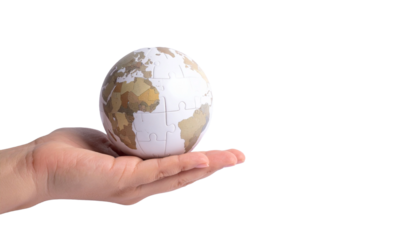 A hand holding a small globe, symbolizing global awareness and responsibility. The globe is resting in the palm, suggesting care