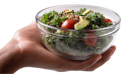 Close up of a hand holding a glass bowl filled with vibrant healthy quinoa salad featuring kale tomatoes and avocado isolated on transparent background