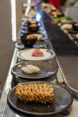 Instant Ramen Noodles on Plate at Shabu-Shabu Conveyor Belt Restaurant
