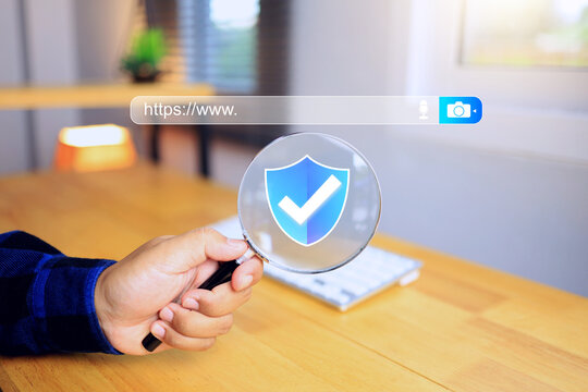 https www search engine security concept with hand using magnifying glass to search domain type more secure an encrypted communication protocol asymmetric algorithm
