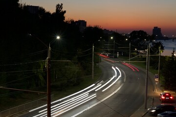 Car lights in the evening city