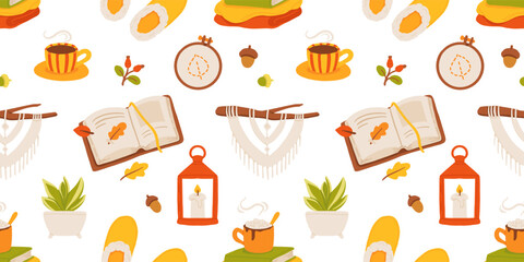 Cozy autumn flat vector seamless pattern with warm home decor, hot drinks, books, candle lantern, slippers, macrame, indoor plant and embroidery hoop. Hygge style fall illustration