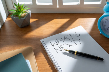 Notebook with the words “What’s Next?” written on a page. Planning, future decisions, career...