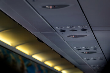 airplane cabin prohibition signs show about no usage of cellular data no smoking and fasting seatbelt light up signs