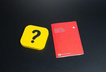 Swiss passport and question mark. FAQ on obtaining or reissuing a Switzerland passport. Features...