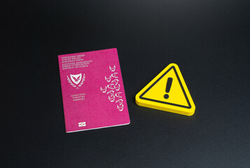 Cyprus passport and caution sign. Tightening of rules for obtaining a passport or citizenship of...