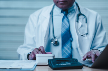 Physician Using Digital Tool for Patient Care and Health Management