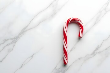 Obraz premium Candy cane for christmas holiday on white marble