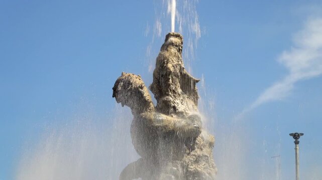 The sculpture of Glaucus, the sea god located in the center of the Naiads fountain in Rome, Italy