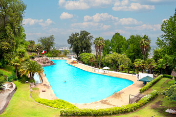 Santiago, Chile, 2020. The Antilén public pool, located on the summit of Cerro Chacarillas, within the Metropolitan Park. It is one of the most popular leisure options for Chilean families.
