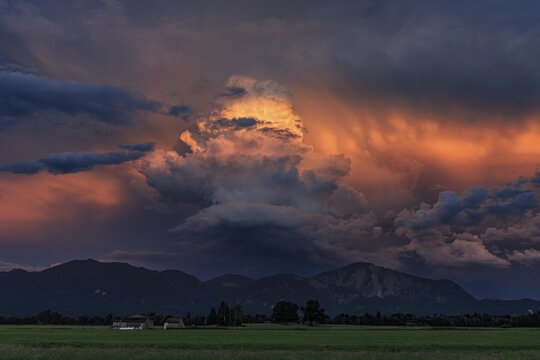 Thunderclouds in the evening light, Loisach-Lake Kochel moor, view of Kochler mountains, Alpine foothills, Bavaria, Germany
