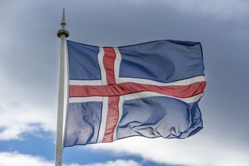 Icelandic flag fluttering in the wind, Iceland