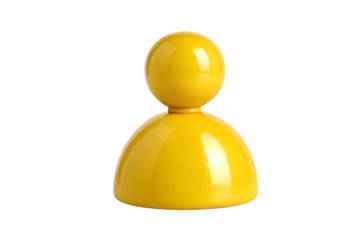 A single bright yellow pawn game piece isolated on a stark black background