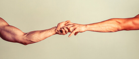Closeup help hand. Two hands, helping arm of a friend, teamwork. Helping hand. Helping hand...